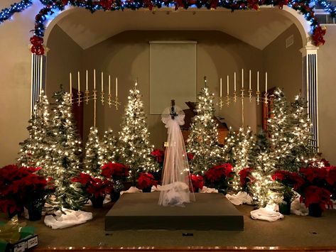 Wedding Cross Altar Christmas, Christmas Tree Altar Wedding, Christmas Themed Wedding Ceremony Decor, Christmas Wedding Photography, Christmas Tree Wedding Backdrop, Christmas Wedding Backdrop, Christmas Wedding Ceremony, Nutcracker Wedding, Wedding Tunnels