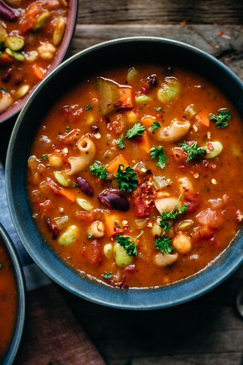 Minestrone is one of our favorite classic soup recipes – this version is vegan and packed with healthy, delicious vegetables, beans and pasta. So comforting! #minestrone #vegansoup #veganrecipes #souprecipe #vegetableminestrone #soup #vegancomfortfood #vegetarian #foodphotography #soupphotography | crowdedkitchen.com Minestrone Soup Photography, Soup Photography, Vegan Minestrone, Vegan Minestrone Soup, Healthy Food Photography, Mediterranean Cookbook, Vegan Italian Recipes, Cod Recipe, Minestrone Soup Recipe