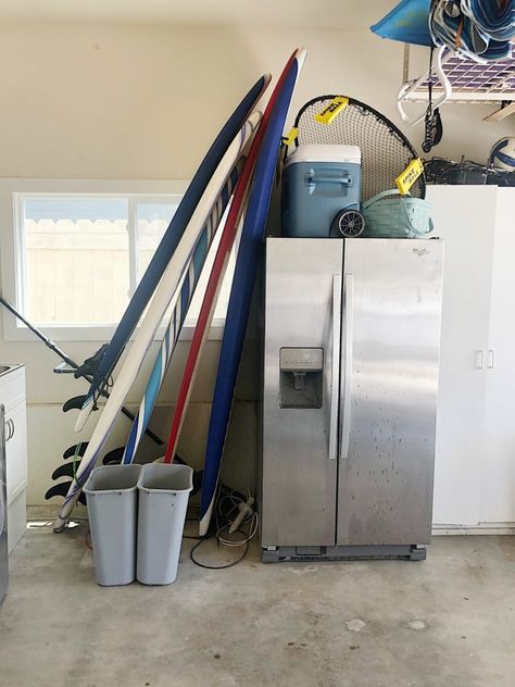 Our garage at the beach was transformed into the most incredible space. The Container Store did a fantastic job with our garage makeover. Cork Dartboard, 100 Year Old Home, New Garage, Beach Chair Umbrella, Old Cabinets, Garage Makeover, Old Home, The Container Store, Custom Closets