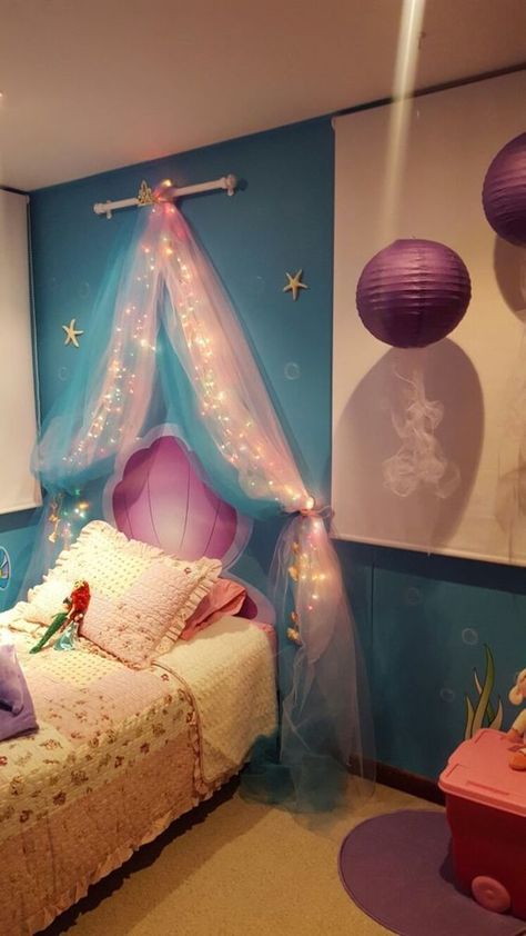 25+ Magical Princess Room Decor Ideas for Your Little Lady Under The Sea Bedroom Kids, Princess Room Decor Ideas, Ariel Room, Mermaid Bedroom Ideas, Ariel Bedroom, Unicorn Nursery Ideas, Little Mermaid Bedroom, Mermaid Themed Bedroom, Mermaid Decor Bedroom