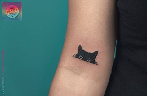 Cat Neck Tattoos Women, Black Cat Arm Tattoo, Small Cat Face Tattoo, Cat Person Tattoo, Cartoon Black Cat Tattoo, Black Cat Finger Tattoo, Minimal Black Cat Tattoo, Black Cat Small Tattoo, Black Cat Wrist Tattoo