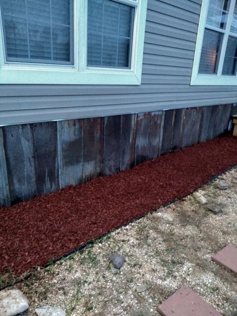 Old metal for underpinning. Underskirting For Mobile Homes, Tin Underpinning Mobile Home, Cheap Trailer Skirting Ideas, Mobile Home Walkway Ideas, Metal Underpinning Mobile Home, Tin Underpinning, Home Underpinning Ideas, Metal Underpinning, House Underpinning Ideas