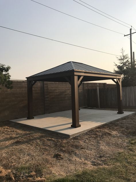 We have a gazebo! Love it! Patio And Gazebo Ideas, Plants Around Gazebo, Patio Gazebo Ideas, Black Gazebo, Rectangular Gazebo, Yard Transformation, Garden Huts, Brick Pathway, Gazebo Ideas