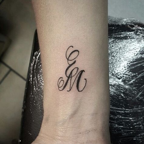 E and M 1st #tattos #tattooed #tattooing #lettering #letteringtattoo #letters #calligraphy #black #e #m Letter M Tattoos, Tattoo Alphabet, Ems Tattoos, Letters Calligraphy, 7 Tattoo, Monogram Tattoo, Favorite Tattoos, M Tattoos, Free Tattoo Designs