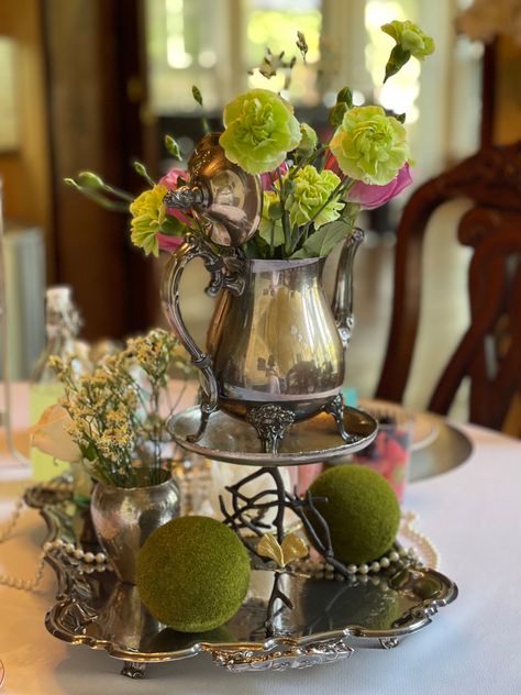 Flower arrangements in silver teapots Silver Teapot Centerpiece, Tea Party Centerpieces, Reception Styling, Silver Teapot, Party Centerpiece, Christmas Centerpiece, Party Centerpieces, Center Pieces, Christmas Centerpieces