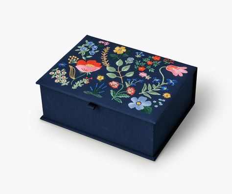 PRICES MAY VARY. BRIGHT, BEAUTIFUL DESIGN: Keep your precious and valuable belongings in one secure and elegant place with the Strawberry Fields Large Embroidered Keepsake Box. The lovely floral pattern will complement your home while housing your possessions! Ideal for gifting to your homemaking-savvy friends or family members. EVERYTHING YOU NEED AND MORE: Rifle Paper Co. offers a wide variety of products that range from stationery and greeting cards to phone cases and home decor. This trendy Hand Painted Wooden Box, Fabric Covered Boxes, Anna Bond, Fabric Box, Bold Aesthetic, Painted Wooden Boxes, Gold Foil Logo, Fabric Boxes, Strawberry Fields