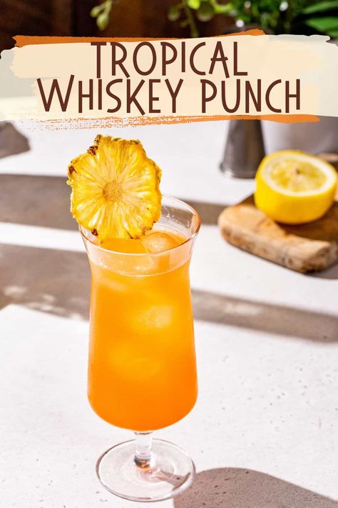 The Tropical Whiskey Punch is such a delicious summer cocktail! A mix of rye whiskey with pineapple, passion fruit and Aperol, it’s perfect on a hot summer day. It’s super easy to mix up and so tasty! This drink is great for anything from casual sipping on the patio to a tropical summer cocktail party! Whiskey Punch, Best Whiskey Cocktails, Whiskey Cocktails Easy, Mixing Cocktails, Rye Cocktails, Punch Drink, Best Whiskey, Yummy Summer Cocktails, Apple Whiskey