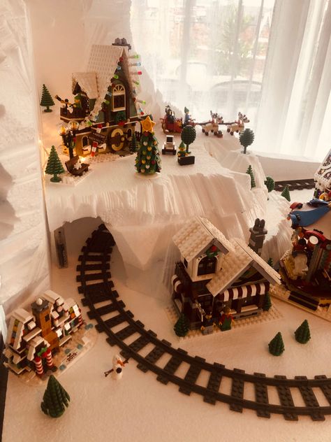 Christmas Lego Village, Lego Christmas Village Display, Winter Village Display, Diy Christmas Village Platform, Christmas Toy Train, Disney Christmas Village, Cabinet Organization Ideas, Lego Christmas Village, Lego Christmas Tree