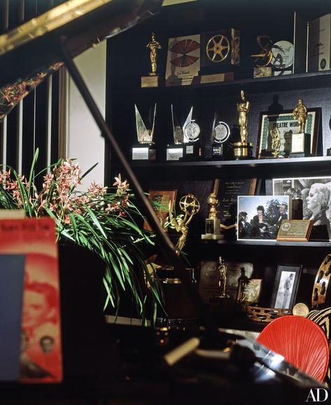 Among Liza Minnelli's awards filling the music room bookcases are an Academy Award for Best Actress in Cabaret, 1972; Tony Awards for Best Actress in The Act and Flora, the Red Menace; an Emmy for the television special Liza with a Z; and various international film honors. Award Shelves, Cabaret 1972, Tony Award, Liza Minnelli, Manhattan Apartment, Dhurrie Rugs, New York Apartment, Low Tables, Tony Awards