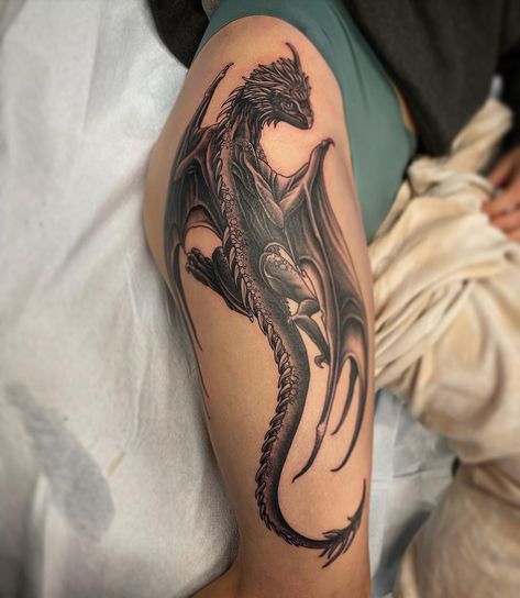 Dragon 🐲🐲by @dalehgm Dale's books are Open! Call to book 7804885070 . . . . . . . #dragon #dragontattoo #theblackandgreytattooleague #blackandgreytattooartist #blackandgreytattoos #blackandgreytattoo #crimsonempiretattoo #crimsonempire #yeg #yegtattoo #yegtattoos #yegtattooshop #yegtattooartist #yeglocal #yegsmallbusiness #yeggers #shoplocalyeg #yegbusiness #yeglife #blackgoldtattooco #BGTC Dragon Crawling Tattoo, Dragon Bicep Tattoos For Women, Protective Dragon Tattoo, Patchwork Dragon Tattoo, Dragon Tattoo Cover Up, Dragon Leg Sleeve Tattoo, Dragon Stomach Tattoo, Dragon Wrapped Around Leg Tattoo, Dragon Tattoo Bicep