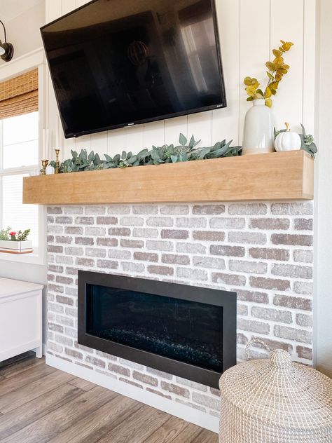 Electric Fireplace Brick, Diy Wooden Fireplace, Shiplap And Brick Fireplace, Brick And Shiplap Fireplace, Simple Diy Fireplace, Vertical Shiplap Fireplace, Builder Grade Fireplace, Easy Diy Fireplace, Boho Fireplace