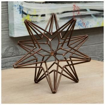 Dimensions: 6.25" H x 7.25" W x 7.25" D Material: Metal Color: Copper Care & Safety: Decorative Use Only Quantity: 1 Add some polished elegance to your home space with this Antique Copper Star Metal Decor. This eye-catching piece features a series of angles connecting and forming a starburst shape. The antique copper finish gives it a charming and classy touch. Display it on your coffee table with complementary decor for a captivating centerpiece!    *No discounts may be applied to “your price” or “reduced” items. Metal Christmas Gifts, Frozen Christmas Tree, Radial Symmetry, Frozen Christmas, Xmas 2024, Decorative Spheres, 3d Star, Metal Christmas, Home Space