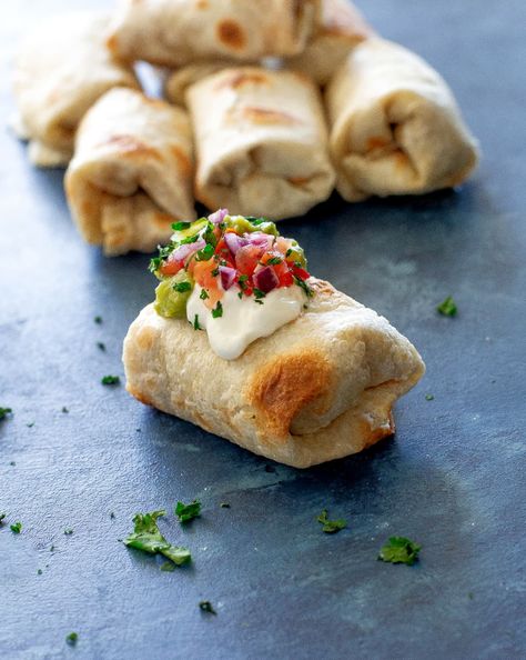 Mini Burritos - a mini version of bean burritos with beans, salsa, and taco meat. #mini #burritos Mini Bean Burritos, Mini Burrito Appetizers, Mexican Food Serving Ideas, Mexican Appies Parties, Lunch Meat Appetizers, Mini Mexican Food Appetizers, Mexican Party Dessert Ideas, Mini Burritos Recipes, Mexican Food Horderves