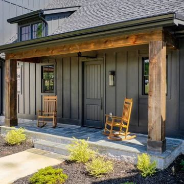 75 Beautiful Black Board and Batten Exterior Home Pictures & Ideas - July, 2021 | Houzz Classic Home Exterior, Home Exterior Design, Board And Batten Exterior, Cabin Exterior, Exterior Home, Casa Exterior, Exterior Remodel, House Siding, House Design Photos