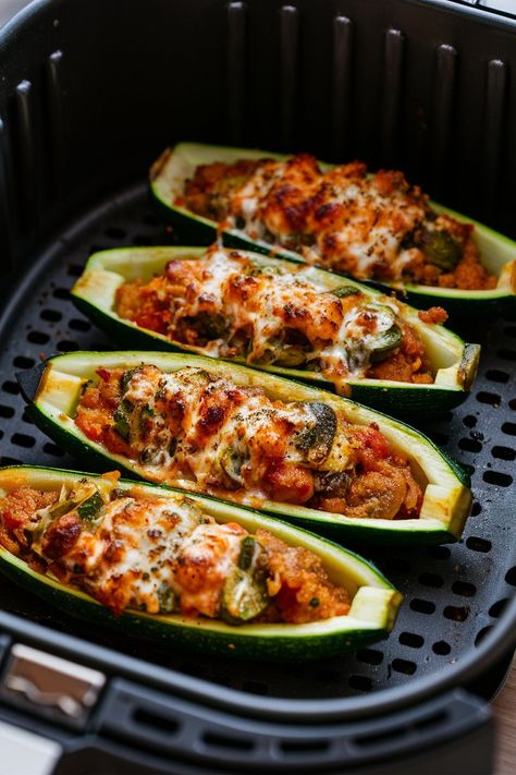 Discover how to make delicious and healthy Air Fryer Zucchini Boats! Perfect for a quick dinner, this recipe combines fresh zucchini with your favorite fillings. Ideal for those looking for Zucchini Boats Air Fryer Recipes or gluten-free options. Try our Air Fryer Zucchini Boats for a tasty and nutritious meal that everyone will love. 🍽️ #StuffedZucchini #ZucchiniBoatsAirFryer #AirFryerZucchini #ZucchiniBoatRecipes Stuffed Zucchini Air Fryer, Zucchini Boats Air Fryer Recipes, Air Fryer Zucchini Boats, Zucchini Boats Sausage, Zucchini Air Fryer, Zucchini Boats Healthy, Air Fryer Zucchini, Zucchini Boat Recipes, Air Fryer Recipes Appetizers