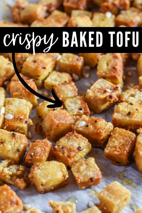 This crispy baked tofu is easy to make and has a delicious golden brown crunch. It’s the tastiest way to make tofu! This recipe is an easy way to bake tofu and gives you step by step instructions so that your tofu turns out perfectly crispy every time! It’s tossed in soy sauce, seasonings and corn starch and then baked in the oven. The best way to describe the taste is like a yummy fried tofu! Add it to noodles, a salad, or eat it over rice. Top it with your favorite sauce. Bake Tofu, Crispy Baked Tofu, Noodles Salad, Tofu Recipes Healthy, Tofu Recipes Easy, Tofu Vegan, Healthy Asian Recipes, Tofu Recipes Vegan, Asian Recipe