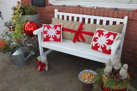 Christmas Porch Decor, definitely going to look into doing this~ Pillows On Bench, Christmas Bench, Michigan Christmas, Porch Bench, The Knick, Bench Outdoor, A White Christmas, Christmas Front Porch, Bench Decor