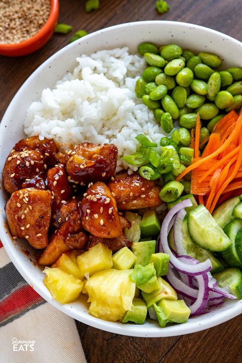 Hawaiian Chicken Poke Bowl - Bursting with freshness and vibrancy, every mouthful offers a symphony of flavours. From succulent chicken in sauce to crisp veggies, pineapple, creamy avocado, fluffy rice, and a drizzle of spicy mayo. Huli Huli Chicken Bowl, Breakfast Poke Bowl, Hawaiian Bowls Chicken, Pineapple Asian Chicken, Hawaiian Chicken Rice Bowl, Hawaii Poke Bowl, Hawaiian Bowls, Chicken Poke Bowl, Hawaiian Bowl