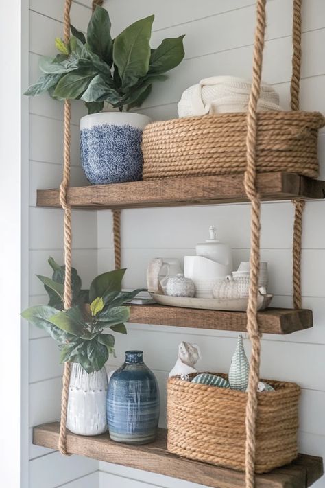 "Transform your space with stylish DIY Rope Shelving! 🛠️🌊 Ideal for creating a breezy, coastal vibe in any room. 🌿✨ #DIYShelving #CoastalInspiration #RopeDecor" Beachy Shelves, Beachy Shelf, Coastal Shelves, Shelves With Rope, Coastal Shelf Decor, Showcase Ideas, Beachy Crafts, Beach Bedroom Decor, Coastal Room