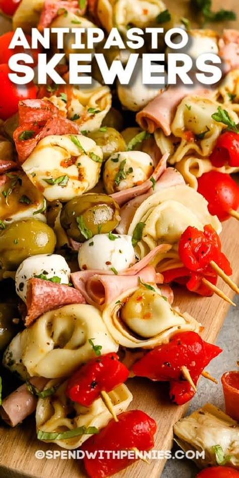 Antipasto Skewers are a fun, elegant way to serve appetizers at a party! Favorite meats, cheeses, tortellini, and olives are skewed and served with red or white wine! #spendwithpennies #antipastoskewer #recipe #appetizer #easy #italian Mini Antipasto Skewers, Tortellini Kabobs Antipasto Skewers, Food To Serve At A Party, Red Party Food, Tortellini Skewers, Appetizer Easy, Italian Recipes Appetizers, Marinated Cheese, Antipasto Skewers