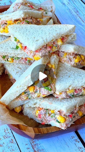 Taghrid Ahmad on Instagram: "My kids lunch box sandwiches the other day, Tuna Sandwiches! This Tuna & Mayo salad is the perfect sandwich filler because #1 it’s cheaper than lettuce 🥬 at the moment 😭 and #2 it’s multi-use! Add on-top of crackers, in wraps, toasted, in vol au vents pastries, for kids parties etc. The mixture keeps well in the fridge for up to 5 days & it’s so tasty, if your kids love Tuna they will love these! Here’s the recipe 😉   For 8 full sized sandwiches cut into 4 triangles (total 32 mini party size) - adjust measurements accordingly for smaller batch.   425g can tuna in spring water or brine, I used @johnwestaustralia brand 1 can corn kernels 3 sliced spring onions  1/2 small red capsicum 3 tablespoons whole egg mayo (or to taste) Lots of freshly cracked pepper  2 Mini Tuna Sandwiches, Tuna Salad Toast, Mini Triangle Sandwiches, Small Sandwiches For Party, Tuna Mayo Sandwich, Mini Sandwiches For Parties, Tuna Toast, Mayo Salad, Tuna Sandwich Recipes