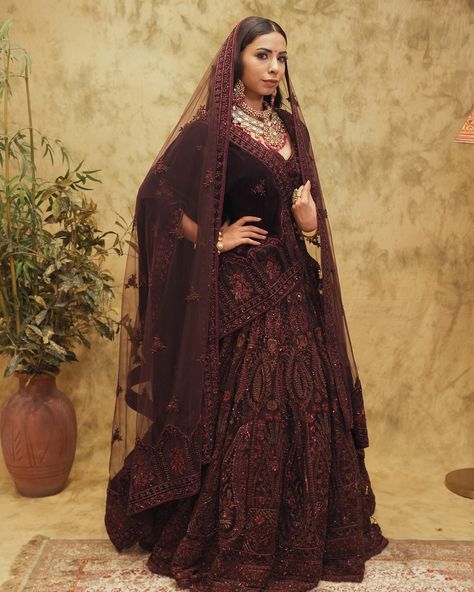 Lavish, luxurious, and unforgettable. Our dark chocolate brown velvet lehenga from the Roohdar Collection is fully embroidered and comes with two dupattas for a royal finish—perfect for a bride who wants to make a statement🤌🏻 For further inquiries and shipping details, please reach out to us at the following contacts: 📞India: 721 721 1400 📞US/Canada: +16614078200 📞Australia/ New Zealand:+61483918030 📞UK: +441908103655 #getethnic #royalindianbride #indianweddinginspiration #indianlehenga #cu... Purple Lehenga Color Combos, Lehenga Color Combos, Dark Purple Lehenga, Purple Lehenga, Velvet Lehenga, Indian Wedding Inspiration, Indian Lehenga, Dark Chocolate Brown, Brown Velvet