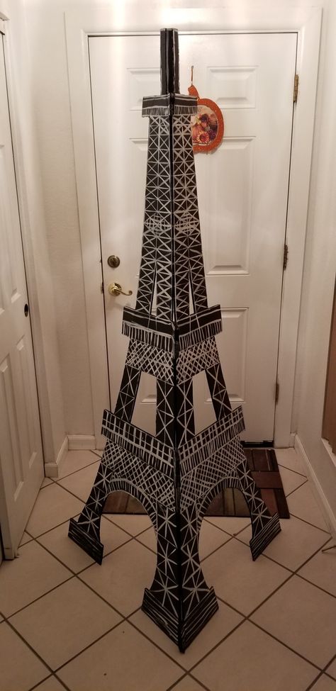 Cardboard Eiffel Tower Diy Eiffel Tower Cardboard Paris Party, Eiffel Tower Prop, Eiffel Tower Cutout, Cardboard Eiffel Tower Diy, Cardboard Eiffel Tower, Diaroma Ideas, Diy Eiffel Tower, Cardboard Relief, French Display