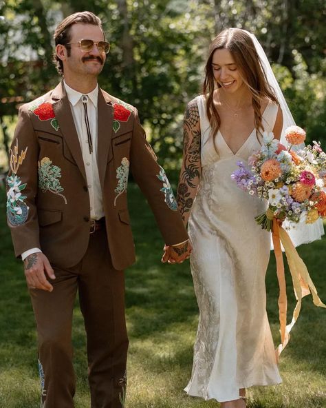 colorful + embroidered wedding suits and groom style: a 2024 wedding trend to watch Non Traditional Wedding Outfit Grooms, Colored Wedding Suits Men, Wedding Statement Pieces, Eclectic Groom Attire, Funky Wedding Suits Men, Embroidered Wedding Suit Men, Colored Suit Groom, Edgy Wedding Suit, Cool Wedding Suits For Men