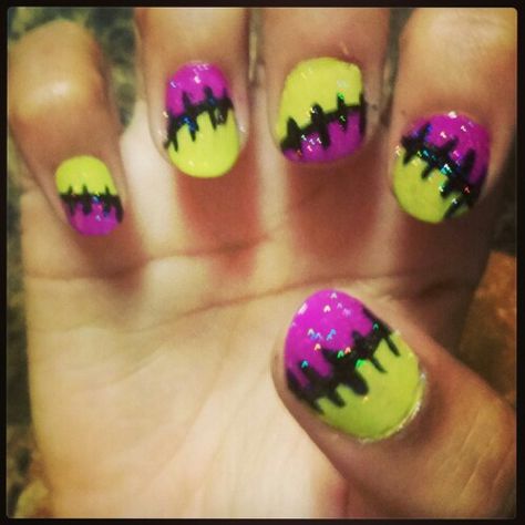 My first Halloween nail design, painted on my sweet baby girl, Jeanine. Frankenstien/stitched nail design in neon purple and lime green, added some extra sparkle with a Northern Lights topcoat. Green Halloween Nails, Halloween Toe Nails, Halloween Toes, Halloween Nail Design, Green Halloween, My First Halloween, Sweet Baby Girl, Olive And June, Purple Halloween