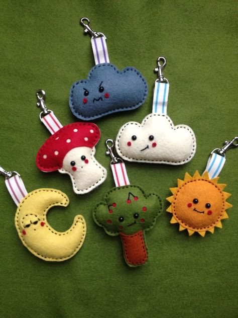 https://www.etsy.com/uk/listing/159620049/new-fun-handmade-felt-clouds-tree-sun?ref=shop_home_active Mini Felt Animals, Diy Key Fob, Fete Ideas, Felt Toys Diy, Felt Fish, Felt Keychain, Felt Crafts Christmas, Baby Shower Crafts, Wallpaper Disney