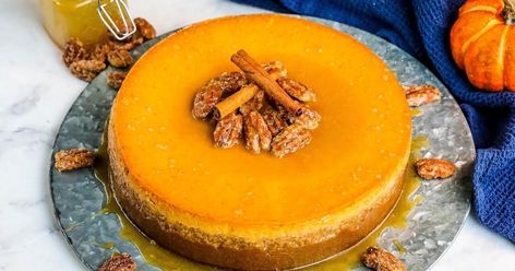 Caramel Pumpkin Cheesecake | Just A Pinch Recipes Carmel Pumpkin Cheesecake, Caramel Pumpkin Cheesecake, Pumpkin Cheesecake Cupcakes, Fun Cheesecake Recipes, Peanut Butter Cheesecake Brownies, Peanut Butter Cup Cheesecake, Mini Pumpkin Cheesecake, Caramel Pumpkin, Pumpkin Bread Pudding