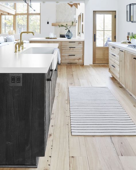 Emily Henderson Mountain House Scandinavian kitchen #home #style Black Stained Kitchen Island, Black Stained Island, Scandinavian Wood Floors, Wood Floors And Wood Cabinets, Kitchen With Back Door, Black Island Wood Cabinets, Scandinavian Cabin Kitchen, Back Door Kitchen, Scandinavian Floors