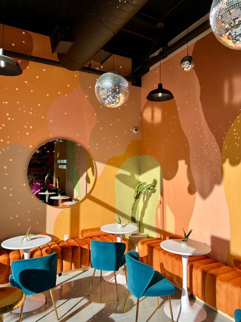 Tulum Restroom Design, Funky Cafe Interior Design, Groovy Cafe Aesthetic, Restaurant Interior Design Colorful, Dispensary Design Interiors, Colourful Cafe Interior Design, Funky Cafe Design, Colorful Commercial Interior Design, Inspiring Interior Design