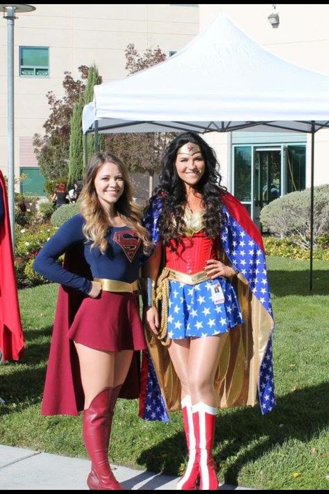 Wonder Woman and Supergirl Supergirl Costume For Women, Wonder Woman Costume Aesthetic, Super Man Costume Women, Superwomen Costume Ideas, Wonder Woman Costume College, Superman Costume Female, Wonder Woman Outfit Ideas, Super Man And Wonderwoman Costumes, Superman And Wonder Woman Costume