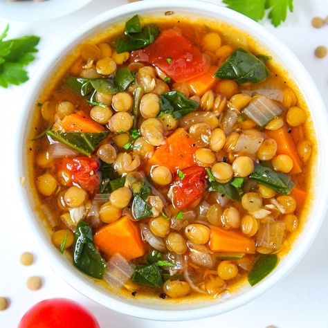 This easy Lentil Spinach Soup recipe comes together in one pot with veggies, warm spices, and protein-rich lentils! It's nutrient-dense, budget-friendly, and freezer-friendly. Plus easy to customize! (Vegan, gluten-free, oil-free.) Lentil Spinach Soup, Brown Lentil Soup, Spinach Soup Healthy, Spinach Lentil Soup, Lentil Spinach, Vegan Lentil Recipes, Butter Bean Soup, Lentil Recipes Easy, Tomato Lentils