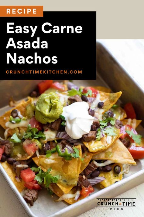 Easy Carne Asada Nachos. These cheesy messy nachos are made with beef and covered with delicious fresh toppings. These fully loaded nachos start with homemade chips and a spicy carne asada, then topped with all your favorite nacho toppings including sour cream and guacamole. This easy recipe is perfect for Tex-Mex lovers and Carne Asada lovers! Learn here how to make homemade tortilla chips and a quick and easy homemade carne asada. Nachos Toppings, Carne Asada Nachos Recipe, Easy Appetizers For Christmas, Homemade Carne Asada, Carne Asada Nachos, Classic Nachos, Asada Nachos, Easy Carne Asada, Appetizers For Christmas