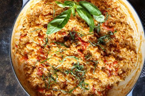 Cheesy Sun-Dried Tomato Risotto Recipe Sun Dried Tomato Risotto, Tomato Risotto Recipes, Filet Mignon Chorizo, Easy Risotto, Risotto Recipes Easy, Autumn Recipes Vegetarian, Tomato Risotto, Vegetarian Recipes Dinner Healthy, Risotto Recipes