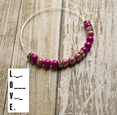 Create beautiful bracelets with the help of this new book by Jade Gedeon. Learn to embed Morse Code in your jewelry in this simple tutorial. Morse Code Bracelet Diy, Secret Message Jewelry, Morse Code Words, Seed Bead Bracelets Tutorials, Morse Code Bracelets, Morse Code Jewelry, Code Bracelets, Morse Code Necklace, Wire Projects