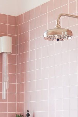 These aren’t your typical 1950s pink bathroom tiles. Old Pink Tile Bathroom Ideas Vintage, Pink Bathroom Floor Tiles, Pink Bathroom Tile Ideas, 50s Pink Bathroom, Fun Tile Bathroom, Old Pink Tile Bathroom Ideas, Pink Bathroom Floor, Pink Tiles Bathroom, Vintage Pink Tile Bathroom