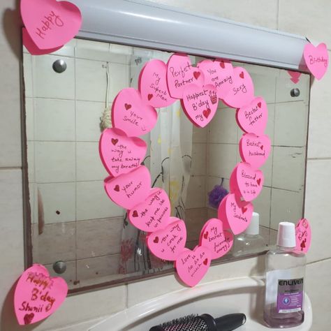 Bathroom mirror decor to surprise your husband on his birthday. To create it I used Heart shape sticky notes to make a big Heart all over mirror and completed it with handwritten messages. Bathroom Sticky Notes Mirror, Post It Mirror, Post It Heart On Mirror, Sticky Note Heart On Mirror, Heart Sticky Notes On Mirror, Bathroom Mirror Decor, Surprise Your Husband, School Bathroom, Birthday Letter