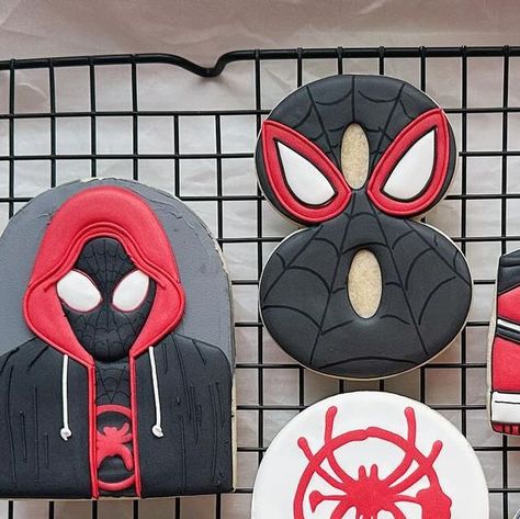 Kassie Fitzgerald on Instagram: "If you saw my reel yesterday, then you got the sneak peek from this super fun set!!! Also, I haven’t seen nor even heard of this new Spiderman until this order came through, and I’m not mad at it! 🙃 Happy Birthday, Theo!! Hope y’all had a great time at Dave and Busters!! 🥳🥳 . . . . . . #Cookies #cookiesofinstagram #cookier #cookieart #cookieartist #decoratedcookies #decoratedsugarcookies #sugarcookies #sugarcookiesofinstagram #royalicing #royalicingcookies #edibleart #wisconsin #wisconsincookier #talentedcookier #spidermancookies #spidermanintothespiderverse #spidermanintothespiderversecookies #intothrspiderversecookies #birthdaycookies #8thbirthday #8thbirthdaycookies" Spidey Party, Spiderman Cookies, Dave And Busters, New Spiderman, Superhero Cookies, Cottage Bakery, Dave & Busters, Cookie Art, Edible Art