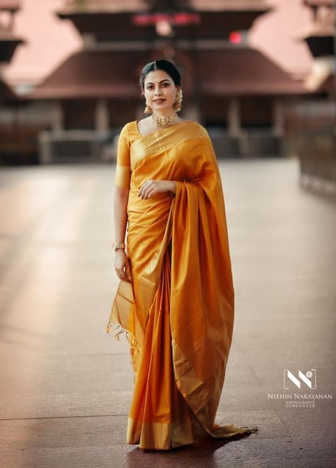 anusree in gold saree in guruvayur Golden Pattu Saree, Gold Pattu Saree, Anusree Nair, Guruvayur Temple, Saree Photography, Bride Reception Dresses, Indian Ethnic Fashion, Keep Me Stylish, Marriage Dress