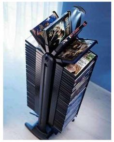 DIY revolving dvd storage - Bing Images. Would love to have instructions for this! Dvd Storage Ideas, Diy Dvd Storage, Diy Dvd, Video Game Storage, Cd Dvd Storage, Cd Storage, Dvd Storage, Game Storage, Video Game Rooms