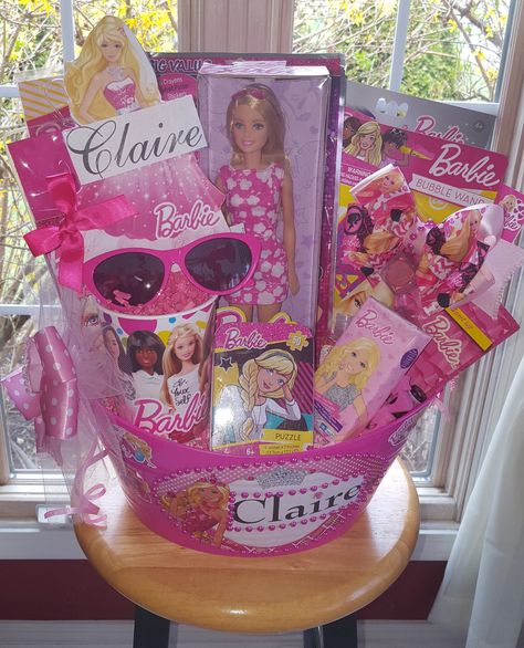 Barbie Theme Gift Basket Made By Norma's Unique Gift Baskets Barbie Theme Gift Hamper, Barbie Raffle Basket, Barbie Theme Gift Basket, Barbie Basket Ideas, Barbie Easter Basket Ideas, Barbie Gift Basket, Barbie Basket, Barbie Gift Ideas, Barbie Easter Basket