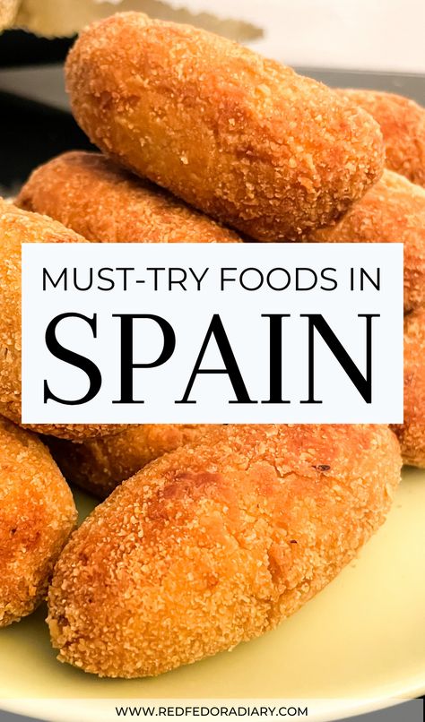 This foodie guide to Spanish cuisine lists the best food in Spain | Spain travel | Spanish food | Spanish cuisine | what to eat in Spain | What to eat in Madrid | what to eat in Barcelona | what to eat in Bilbao | Barcelona travel | Madrid travel | Bilbao travel | Barcelona Spain | Madrid Spain | Bilbao Spain |  Spanish cuisine tapas | traditional food in Spain | food in Spain Barcelona | food in Spain Madrid | Spain food | Spain food traditional | food from Spain | Barcelona Spain food Best Food In Spain, Traditional Spain Food, Spain Cities To Visit, Spain Things To Do, Madrid Spain Food, Food In Spain Aesthetic, Spanish Food Recipes Spain, Barcelona Spain Food, Spanish Food Spain