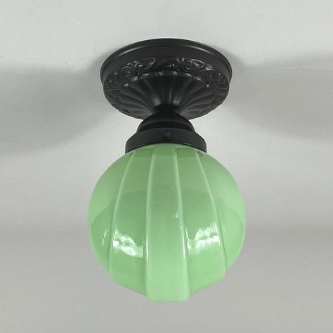 This art deco flush mount was designed and manufactured in germany in the 1920s to 1930s. It features a pale green opaline lampshade and bronzed / burnished hardware. The light requires one e26 / e27 bulb (led recommended). Diameter of canopy is 5.7" (14.5 cm). Rewired. All lighting is converted for us usage. We are unable to confirm that any electrical item meets ul-listing standards at our facility. up to 250v (europe/uk standard).the wiring of this item may be original and might need replacem 1920 Home Decor Interior Design, Art Deco Home Design, 1920 Home, Art Deco Ideas, Art Deco Bathroom, Green Glassware, Art Deco Furniture, The 1920s, Art Deco Interior