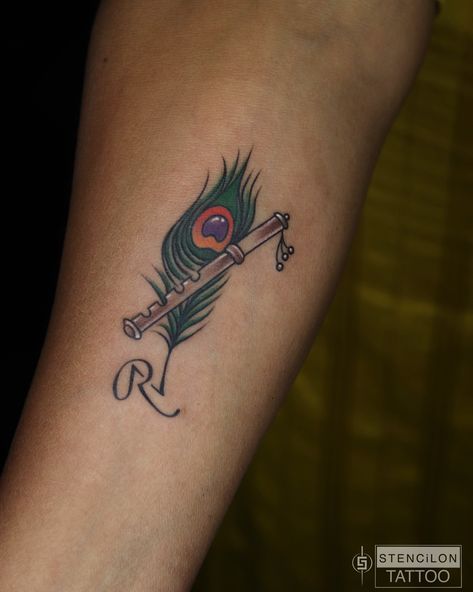 PEACOCK FEATHER WITH FLUTE TATTOO Minimalist Peacock Feather Tattoo, Feather With Flute Tattoo, Peacock Feather With Flute, Mor Pankh Tattoo, Peacock Feather Tattoo Design, Peacock Feather Drawing, Flute Tattoo, Feather Tattoo Colour, Studio Wallpaper