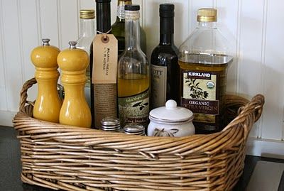 Gather up all those oils and vinegars as well as salt and pepper shakers in a basket by the stove...Duh! Pantry Organization, Kitchen Pantry, Kitchen Items, Beautiful Kitchens, Kitchen Stuff, Salt And Pepper Shakers, Home Staging, Kitchen Counter, Dream Kitchen