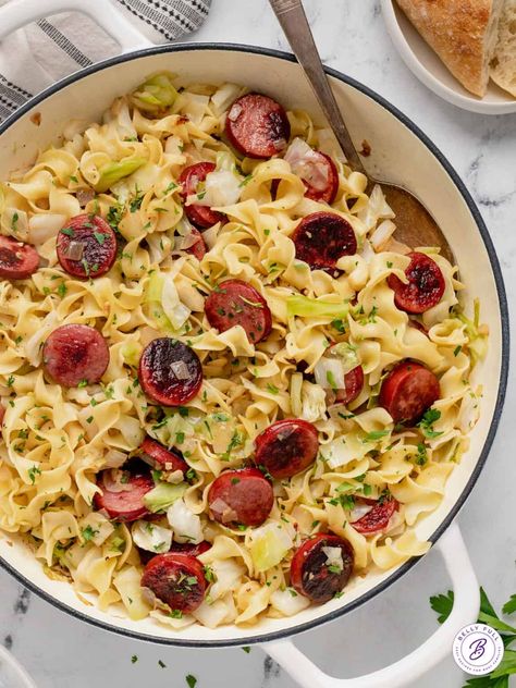 This Haluski recipe features fried cabbage and noodles plus kielbasa and lots of butter. It's a savory, satisfying side dish or entree that can be prepared in under 30 minutes. Kielbasa And Egg Noodles Recipes, Turkey Polish Sausage Recipes Healthy, Polish Sausage Recipes Kielbasa Egg Noodles, Recipes With Turkey Sausage Links, Smoked Sausage And Egg Noodles, Recipes Using Turkey Sausage, Sausages Meals, Egg Noodles And Sausage, Sausage And Noodle Recipes