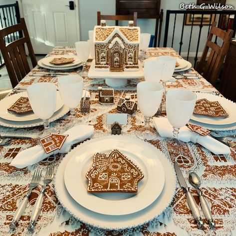 Gingerbread Houses on a Christmas Tablescape, more information about everything on this table setting and where it all came from in my blog post about it all here: https://www.whispersoftheheart.com/blog/2023/12/5/gingerbread-on-a-christmas-tablescape Gingerbread Christmas Table Setting, Gingerbread Table Setting, Gingerbread Place Setting, Christmas Table Gingerbread, Gingerbread Theme Table Decorations, Gingerbread House Tablescape, Gingerbread Table Decor, Gingerbread Dining Table Decor, Ginger Bread Decor